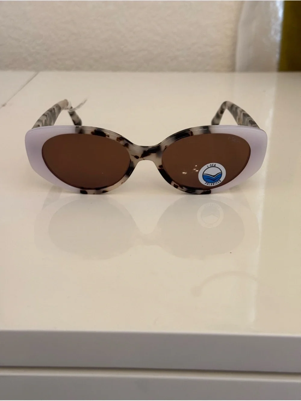 Anthropologie Tortoiseshell and White Oval Sunglasses - Brown Lenses